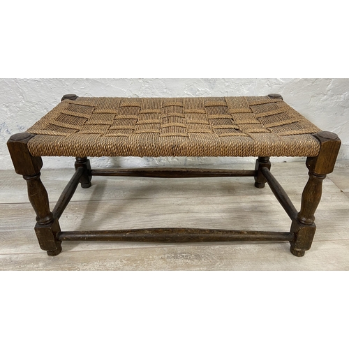 168 - Two oak framed woven stools