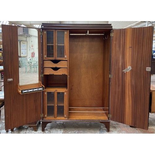 147 - A 1920s mahogany gentleman's compactum double wardrobe with fitted interior - approx. 181cm high x 1... 