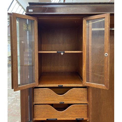 147 - A 1920s mahogany gentleman's compactum double wardrobe with fitted interior - approx. 181cm high x 1... 