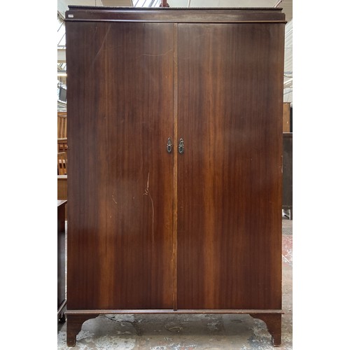 147 - A 1920s mahogany gentleman's compactum double wardrobe with fitted interior - approx. 181cm high x 1... 