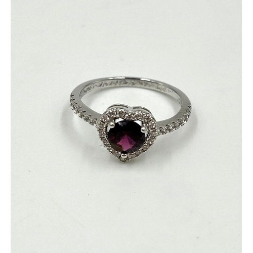 2120 - An 18ct white gold garnet and CZ heart shaped dress ring, size O - approx. gross weight 2.1g