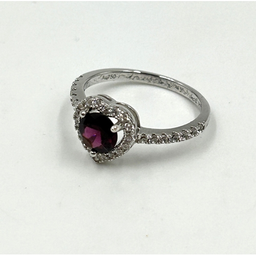 2120 - An 18ct white gold garnet and CZ heart shaped dress ring, size O - approx. gross weight 2.1g