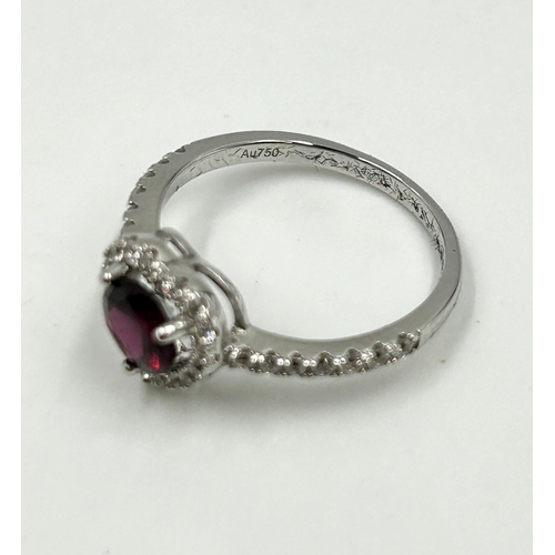 2120 - An 18ct white gold garnet and CZ heart shaped dress ring, size O - approx. gross weight 2.1g