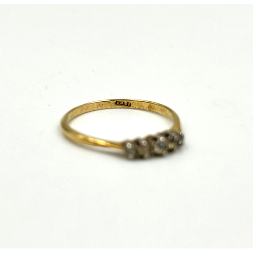 2125 - An 18ct gold five stone ring, size O½ - approx. gross weight 1.6g