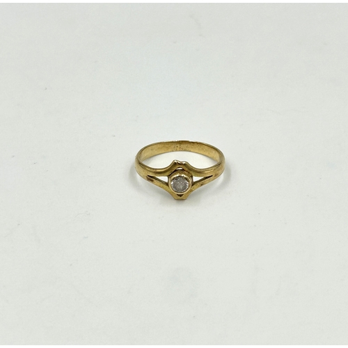 2127 - A yellow metal clear stone solitaire ring, size N - approx. gross weight 2.3g