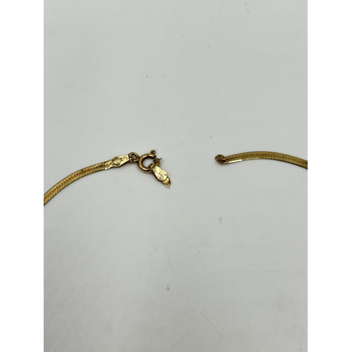 2140 - Two pieces of 9ct gold jewellery for scrap - approx. gross weight 4.5g