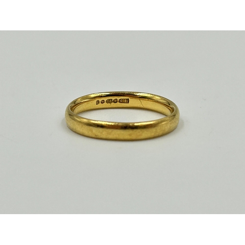 2145 - A hallmarked Birmingham 22ct gold wedding band, size J - approx. gross weight 3.5g