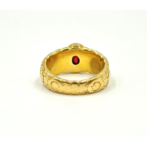 2150 - A yellow metal red stone set solitaire ring, size M - approx. gross weight 10.6g