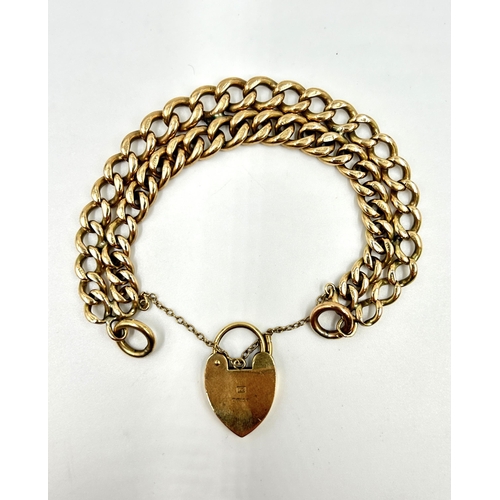 2152 - A hallmarked 9ct gold double row chain bracelet with hallmarked 9ct gold heart shaped padlock clasp ... 