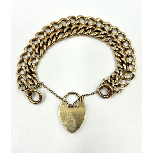 2152 - A hallmarked 9ct gold double row chain bracelet with hallmarked 9ct gold heart shaped padlock clasp ... 