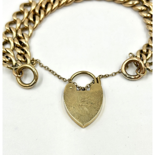 2152 - A hallmarked 9ct gold double row chain bracelet with hallmarked 9ct gold heart shaped padlock clasp ... 