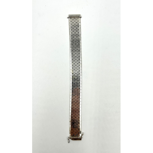 2154 - A mid 20th century hallmarked London 9ct white gold articulated textured 'brick effect' bracelet, da... 