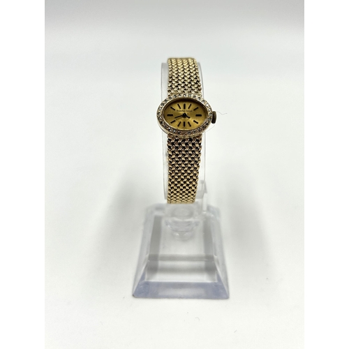 2179 - A mid 20th century Bueche-Girod 9ct gold cased manual wind lady's wristwatch with diamond set bezel ... 