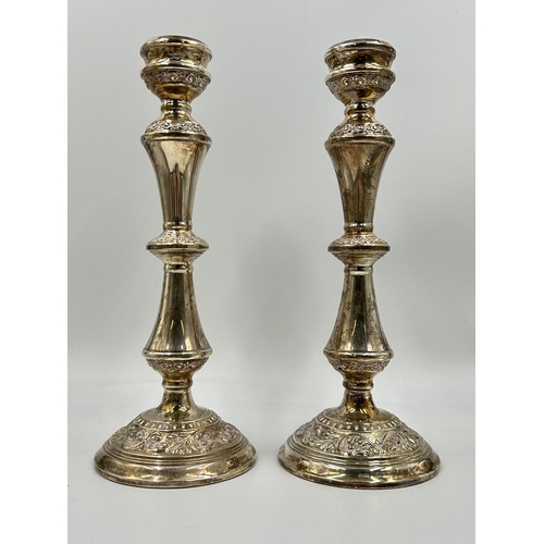 2221 - A pair of W I Broadway & Co. hallmarked Birmingham silver weighted candleholders, dated 1974 - appro... 