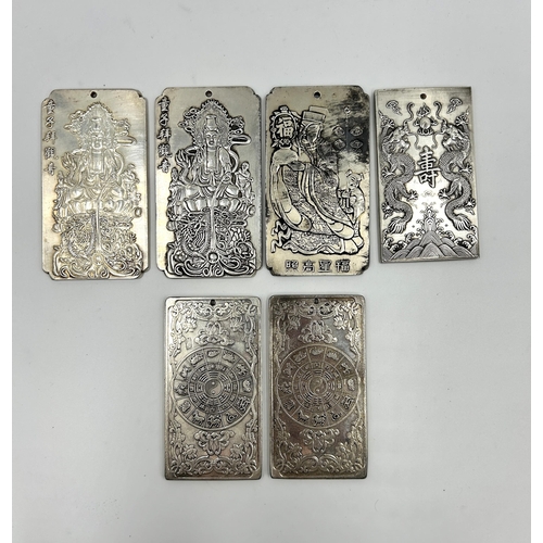 2224 - Six Chinese Tibetan Silver embossed amulets - approx. gross weight 828g and largest approx. 10cm hig... 