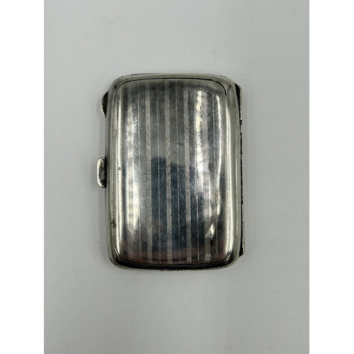 2225 - A George V hallmarked Birmingham silver cigarette case, dated 1924 - approx. gross weight 51g