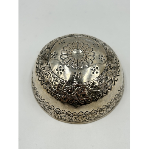 2226 - A Middle Eastern white metal embossed bowl - approx. 4.5cm high x 11cm diameter and approx. gross we... 