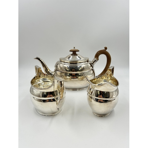 2228 - A Roberts & Belk Ltd hallmarked Sheffield silver three piece tea set, dated 1970 - approx. gross wei... 