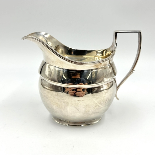 2228 - A Roberts & Belk Ltd hallmarked Sheffield silver three piece tea set, dated 1970 - approx. gross wei... 