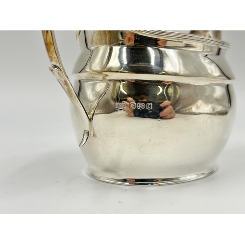 2228 - A Roberts & Belk Ltd hallmarked Sheffield silver three piece tea set, dated 1970 - approx. gross wei... 