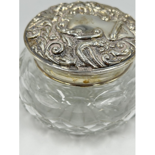 2231 - Two pieces of hallmarked Birmingham silver and cut glass, one W I Broadway & Co circular powder jar,... 