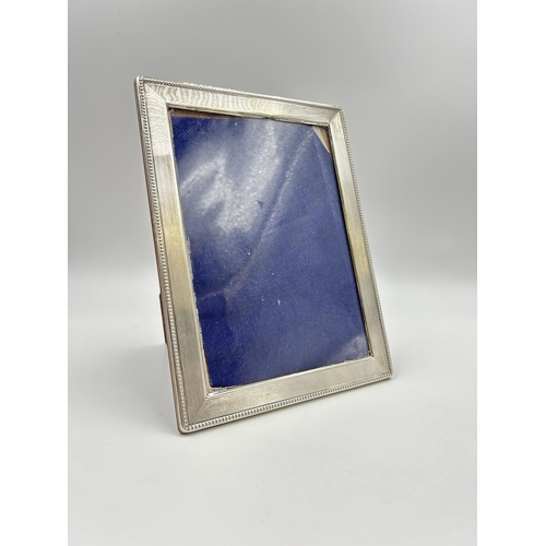 2232 - A stamped .925 sterling silver photograph frame - approx. 21cm high x 16cm wide