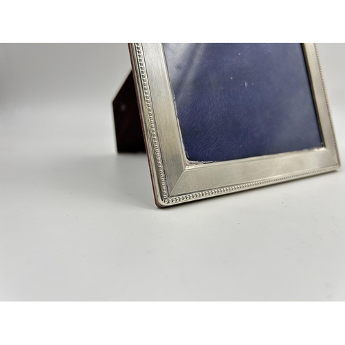 2232 - A stamped .925 sterling silver photograph frame - approx. 21cm high x 16cm wide