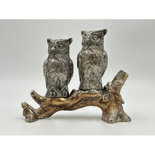 2234 - Two vintage white metal owl shaped pepper pots on tree branch stand - approx. 11cm high x 12cm wide