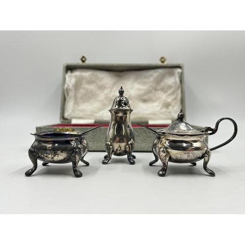 2239 - A cased Robert & Dore Ltd. hallmarked Birmingham five piece silver condiment set, dated 1978 - appro... 