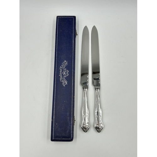 2240 - Two hallmarked Dublin silver handled cake knives, one cased