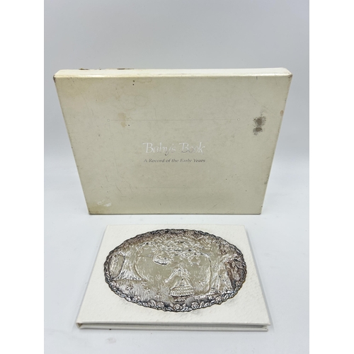 2242 - A boxed Keyford Frames Ltd. hallmarked Birmingham silver baby's book, dated 1993