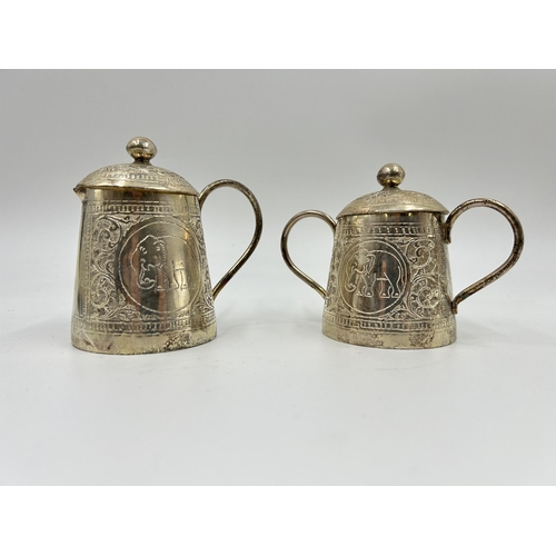 2244 - An Indian white metal four piece tea set with engraved elephant design - approx. gross weight 1026g