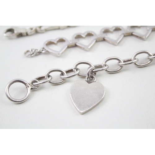 2099 - Three sterling silver bracelets to include diamond set heart shaped etc. - approx. gross weight 72g