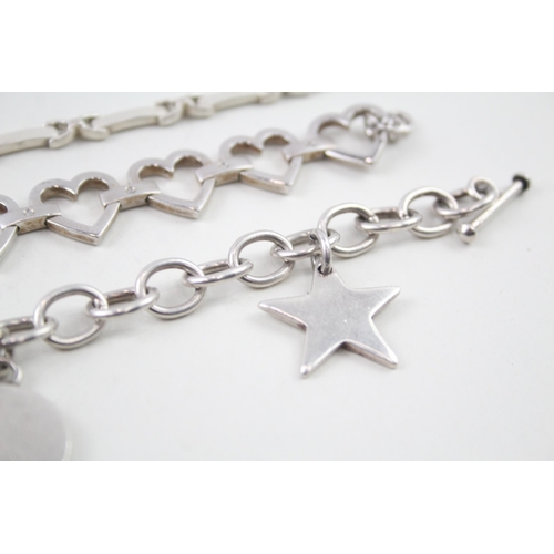 2099 - Three sterling silver bracelets to include diamond set heart shaped etc. - approx. gross weight 72g