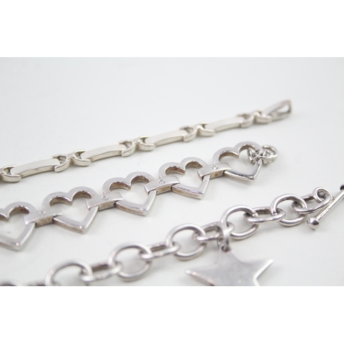 2099 - Three sterling silver bracelets to include diamond set heart shaped etc. - approx. gross weight 72g