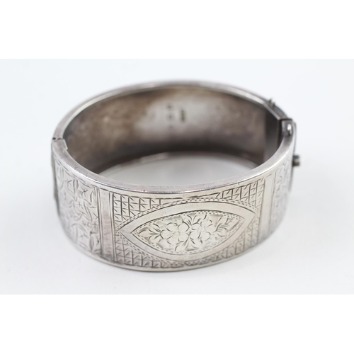 2100 - A hallmarked Birmingham silver etched bangle, dated 1933 - approx. gross weight 39g