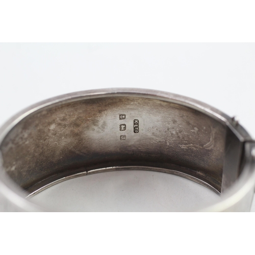 2100 - A hallmarked Birmingham silver etched bangle, dated 1933 - approx. gross weight 39g