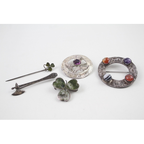 2102 - Five Scottish hallmarked sterling silver brooches to include Connemara marble etc. - approx. gross w... 