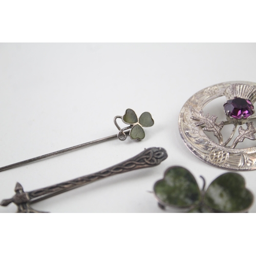 2102 - Five Scottish hallmarked sterling silver brooches to include Connemara marble etc. - approx. gross w... 