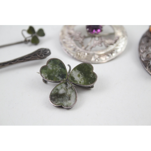 2102 - Five Scottish hallmarked sterling silver brooches to include Connemara marble etc. - approx. gross w... 