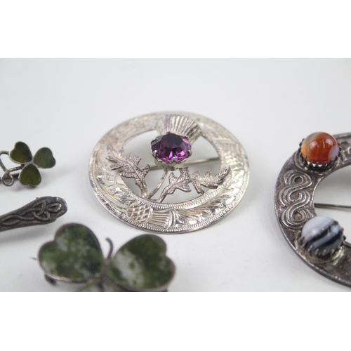 2102 - Five Scottish hallmarked sterling silver brooches to include Connemara marble etc. - approx. gross w... 