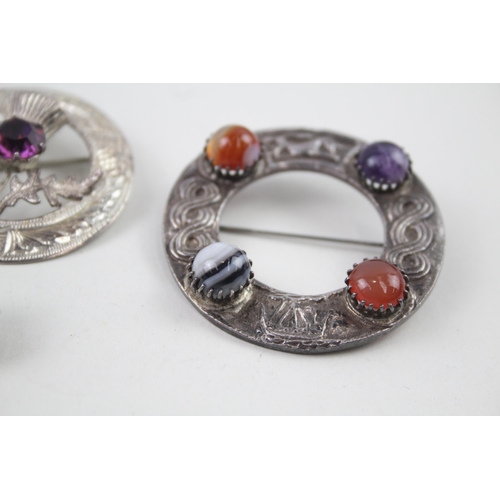 2102 - Five Scottish hallmarked sterling silver brooches to include Connemara marble etc. - approx. gross w... 