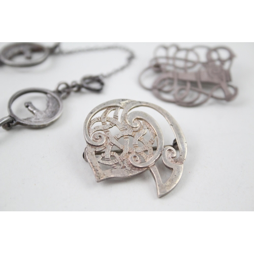 2106 - Three pieces of Celtic sterling silver jewellery, one Ola Gorie brooch, one Shetland brooch and one ... 