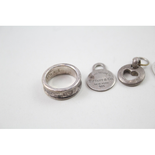 2108 - Four pieces of Tiffany & Co .925 silver jewellery, one ring and three pendants - approx. gross weigh... 