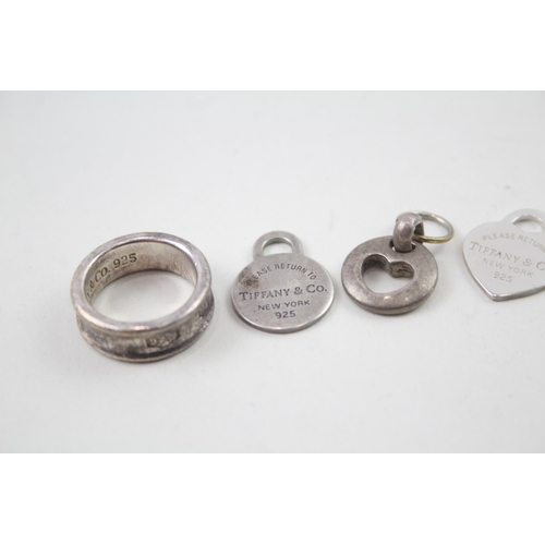 2108 - Four pieces of Tiffany & Co .925 silver jewellery, one ring and three pendants - approx. gross weigh... 