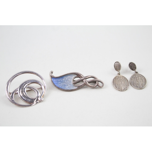 2109 - Three pieces of sterling silver jewellery, two Malcolm Gray for Ortak brooches and one pair of Ola G... 