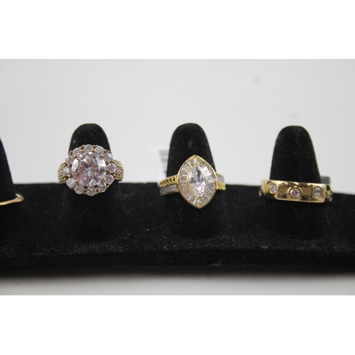 2121 - Six .925 gilt silver gemstone set rings to include CZ, topaz, garnet etc. - approx. gross weight 18g