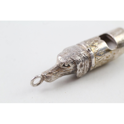 2123 - A vintage sterling silver whistle with dogs head design - approx. gross weight 12g