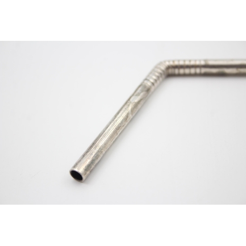 2202 - A hallmarked sterling silver drinking straw, dated 2000 - approx. gross weight 20g