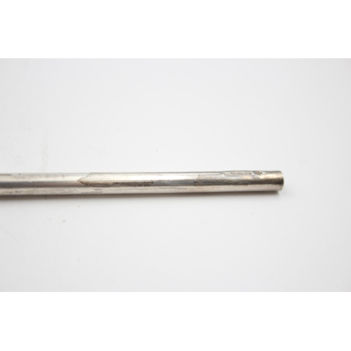 2202 - A hallmarked sterling silver drinking straw, dated 2000 - approx. gross weight 20g